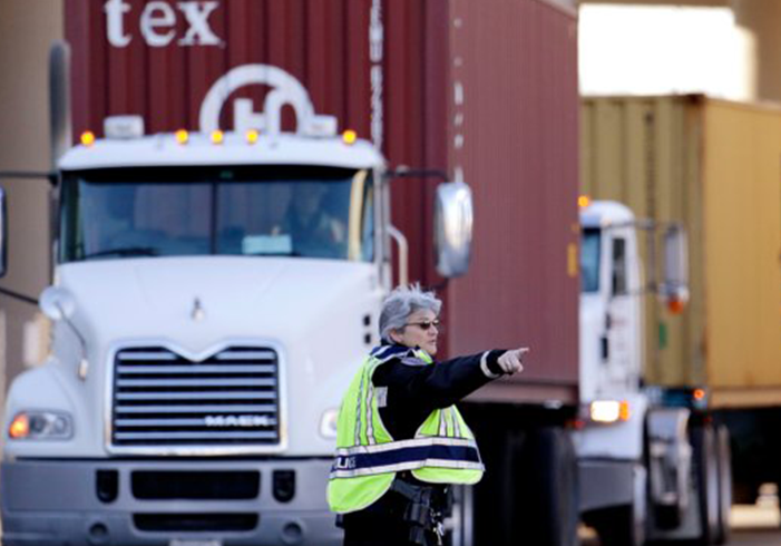 Customs officer directing traffic